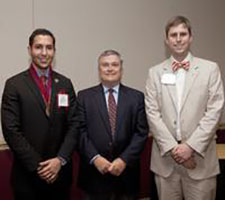 Florida State President Eric J. Barron, center, recently welcomed student Aviram "Avi" Assidon, left, into the Garnet and Gold Scholar Society. Assidon served as SGA president and a member of the university's Board of Trustees for 2011-2012. At right is James Hunt, an adviser to the Garnet and Gold Scholar Society in the Division of Student Affairs.