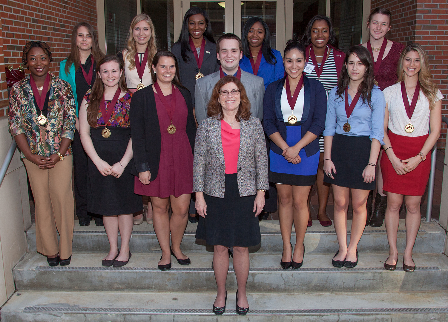 FSU's Executive Vice President for Academic Affairs Garnett S. Stokes stands front and center with the new members of the Garnet and Gold Scholar Society.