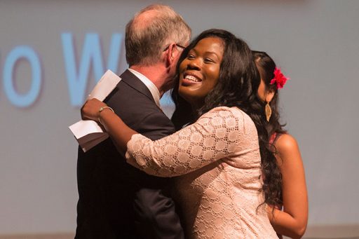 Shlermine Aupont embraces College of Medicine Dean John P. Fogarty after learning she had matched with the new General Surgery Residency Program at Tallahassee Memorial Hospital. Florida State University is the surgery program’s institutional sponsor.