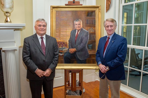 Former FSU President Eric Barron and artist Ed Jonas at the unveiling of the presidential portrait of Eric Barron Tuesday, Oct. 4.