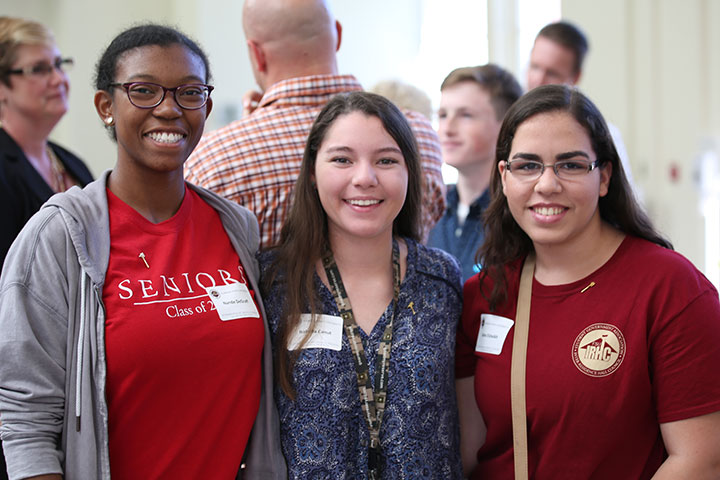 Nande DeGraff, Isabella Canut and Salma Elsheikh – students in the new Interdisciplinary Medical Sciences B.S. Degree Program — enjoy the program's kickoff celebration Friday, Oct. 14. (College of Medicine photo)