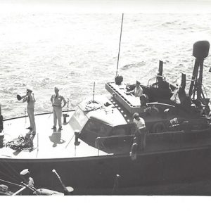 A PT-31 before or on December 10, 1941 as well. You can see the number 31 on the front hull. This boat was commanded by LTJG E. G. DeLong who is probably pictured in this image, but not sure. This boat was grounded and scuttled at Subic Bay, Luzon, January 20th, 1942 to prevent capture.