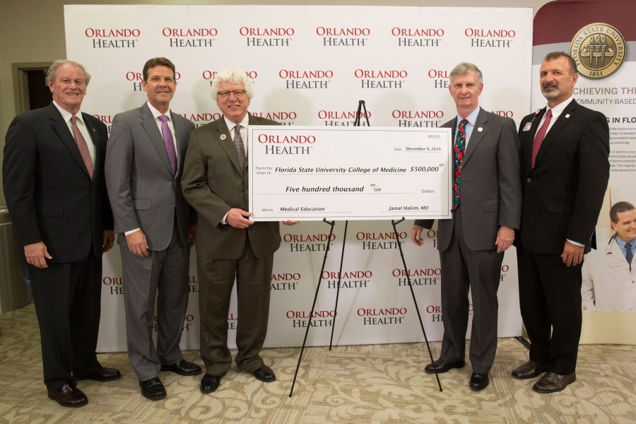 President John Thrasher, Sen. Andy Gardiner, Campus Dean Michael Muszynski, College of Medicine Dean John Fogarty and Jamal Hakim, M.D., chief operating officer for Orlando Health.