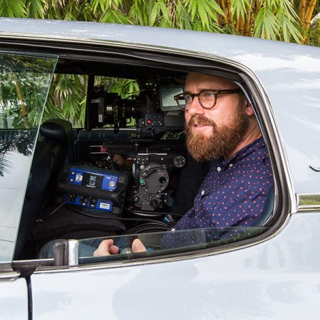 Cinematographer James Laxton squeezes his camera gear into the backseat of a vintage Chevy Impala to film scenes for the Oscar-nominated film "Moonlight." Laxton is up for an Oscar in cinematography for his work on the film.