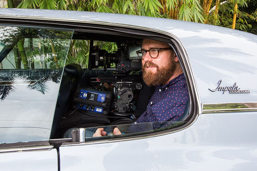 Cinematographer James Laxton squeezes his camera gear into the backseat of a vintage Chevy Impala to film scenes for the Oscar-nominated film "Moonlight." Laxton is up for an Oscar in cinematography for his work on the film.