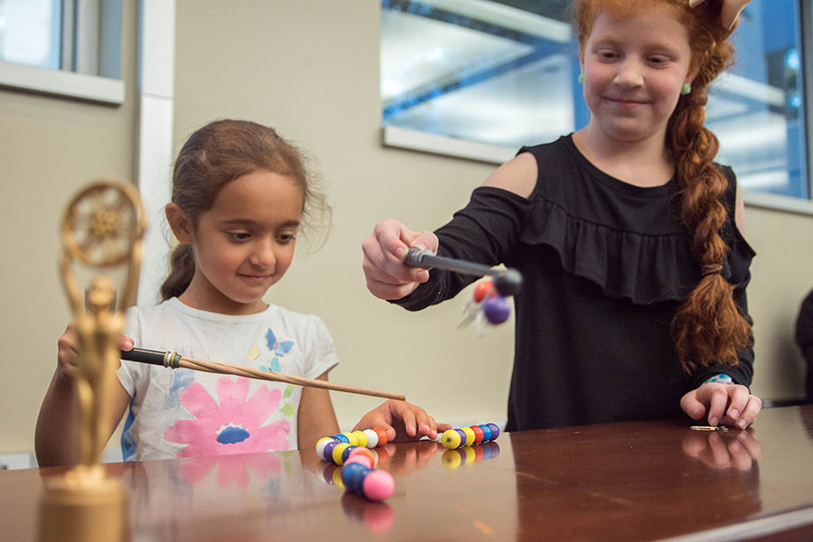 At this year’s movie-themed MagLab Open House, visitors can use Potteresque “magnet wands” to explore how magnets work. Photo credit: Stephen Bilenky/National MagLab.