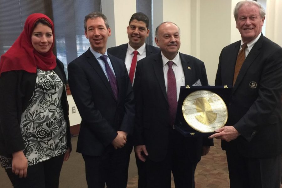 President John Thrasher, at right, accepts a commemoration honoring FSU during a luncheon welcoming the Egyptian education administrators. From left: Dr. Nouran Abd El Hamid Ibrahim of Mansoura University; Anthony Koliha, director of the U.S. Department of State’s Office of Global Educational Programs; Dr. Ibrahim Elbesoumy of Alexandria Technical Institute; and Professor Dr. Essam Khamis Alhanash, deputy minister of higher education and research, Arab Republic of Egypt.