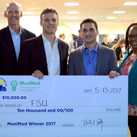Tucker Russ and Maxwell Brecher won the MuniMod Hackathon competition hosted by the Florida League of Cities and business incubator Domi Station in Orlando.