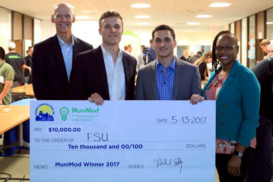 Tucker Russ and Maxwell Brecher won the MuniMod Hackathon competition hosted by the Florida League of Cities and business incubator Domi Station in Orlando.