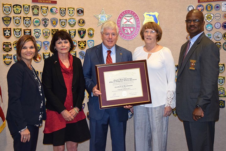 Pictured: Lori Mizell, Commission Executive Director; Kitty Aggelis, Audit Director, Sam McCall; Chief Audit Officer; Janice Foley, Audit Director; and Anthony Holloway, Commission Chair. Not pictured: Debbie Arrant, OIGS Investigator. (Photo courtesy FSU OIGS)