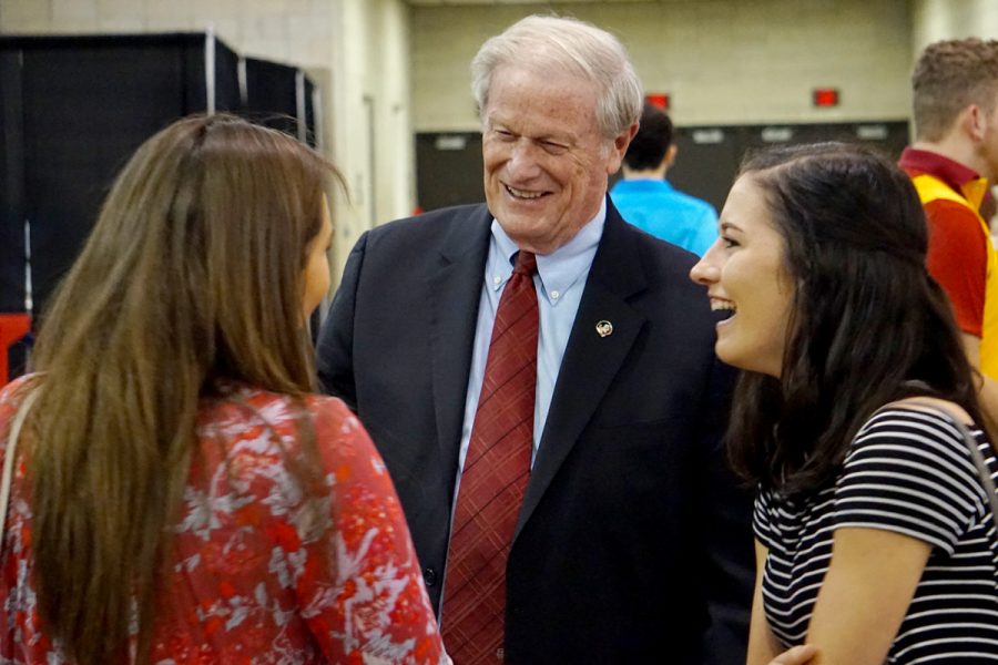 President John Thrasher greets students after the New Student Convocation. (Dave Heller)