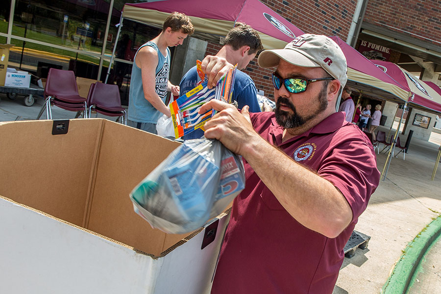 FSU staff members and volunteers collect donations at the Hurricane Irma relief drive Thursday, Sept. 14, at the Donald L. Tucker Civic Center.