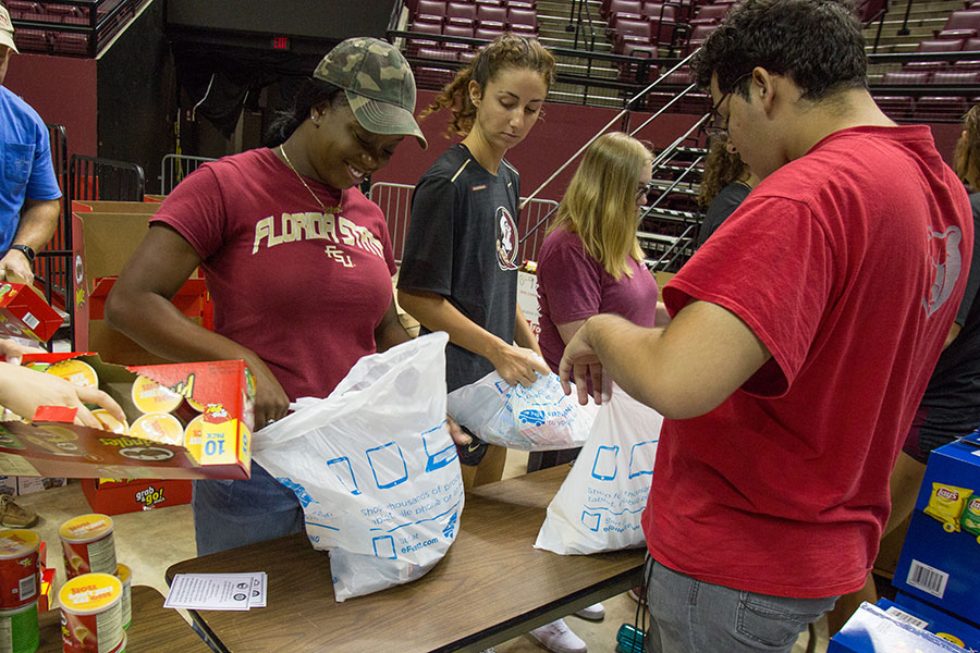 More than 250 FSU students and 100 staff volunteers assembled care packages for Hurricane Irma victims Friday, Sept. 15, at the Donald L. Tucker Civic Center. (FSU Photography Services)