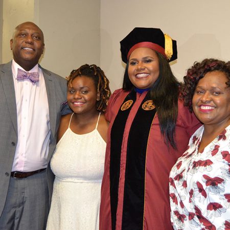 Lataisia Jones, second from right, with her parents and sister at FSU summer commencement Aug. 5, 2017.