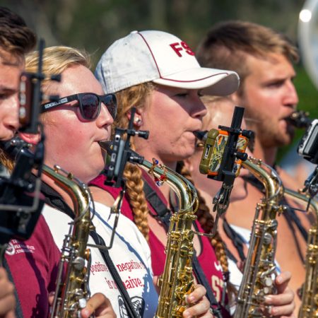 The Marching Chiefs are going green by using a new "eFlip" mount that allows band members to use smartphones or tablets for song music rather than printed sheet music. (FSU Photography Services)