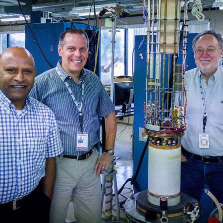 Sastry Pamidi (left), joined by fellow engineers Lance Cooley (middle) and David Larbalestier, landed a grant to make more efficient industrial motors. (Photo credit: Stephen Bilenky/National MagLab)