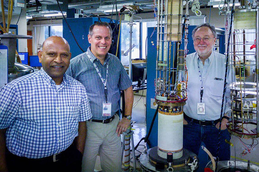 Sastry Pamidi (left), joined by fellow engineers Lance Cooley (middle) and David Larbalestier, landed a grant to make more efficient industrial motors. (Photo credit: Stephen Bilenky/National MagLab)