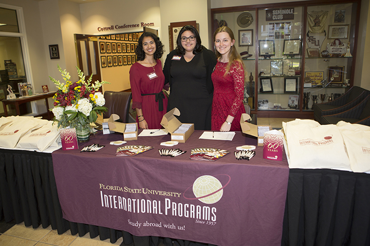 International Programs 60th Anniversary Dinner. (From left to right are Yasmine Chami, Dana Leger, and Katherine Thornton- International Programs student recruiters.) (Photo: FSU Photography Services)