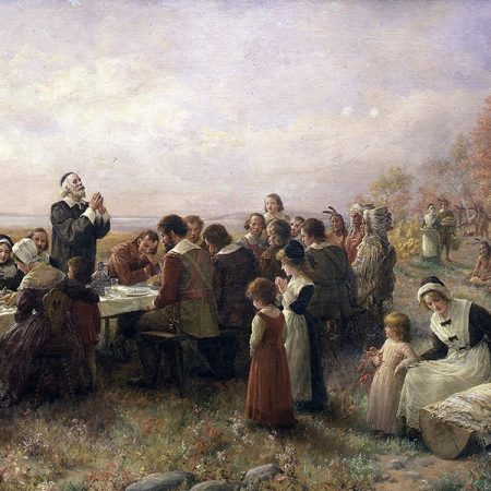 Jennie A. Borwnscombe's "The First Thanksgiving at Plymouth" (1914) depicts an idyllic scene of colonists and Native Americans gathered in friendship for a lavish meal. There's only one problem: The story of the first Thanksgiving is a myth.
