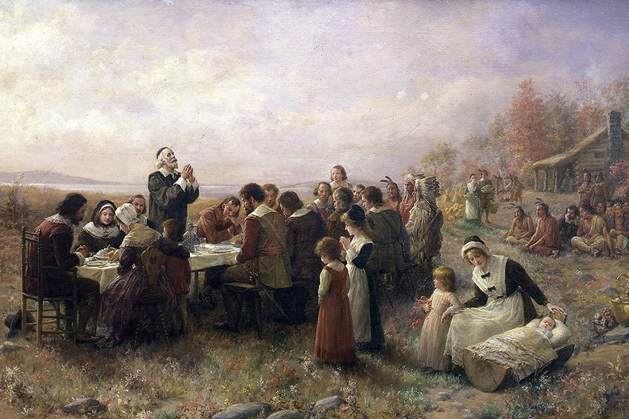 Jennie A. Borwnscombe's "The First Thanksgiving at Plymouth" (1914) depicts an idyllic scene of colonists and Native Americans gathered in friendship for a lavish meal. There's only one problem: The story of the first Thanksgiving is a myth.