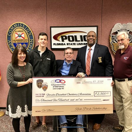 From left to right: Laurie LoRe-Gussak, Florida Disabled Outdoor Association; John Wilcox, UoC President; J.R. Harding, instructional specialist; Chief of FSUPD David Perry; Mike Rodes, retired FSUPD officer (Photo: FSUPD)