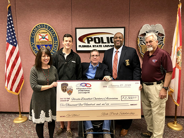 From left to right: Laurie LoRe-Gussak, Florida Disabled Outdoor Association; John Wilcox, UoC President; J.R. Harding, instructional specialist; Chief of FSUPD David Perry; Mike Rodes, retired FSUPD officer (Photo: FSUPD)