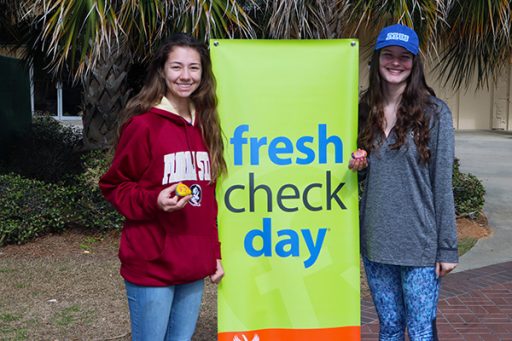 Freshmen Melanie Porter (left) and Darcy Farwell (right) enjoyed the festivities and learning about mental health on campus. (Photo: University Communications)