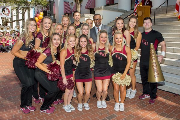 Coach Willie Taggart and the FSU cheerleaders during FSU Day at the Capitol Feb. 6, 2018. (FSU Photography Services)