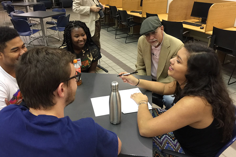 Jessica Bachansingh and other members of her InnoVenture Weekend team begin to sketch out their ideas for what became Findr, the winning entry in the InnoVenture challenge.