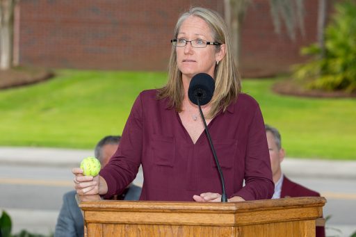 Jennifer Hyde, Florida State head women’s tennis coach, holds the same tennis ball that she used 25 years ago to help dedicate FSU’s new Scott Speicher Tennis Center. (FSU Photography Services)