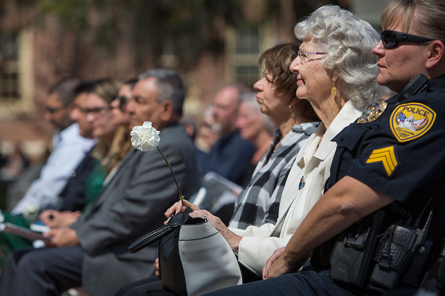 Family members, friends and community members gather to honor eight College of Criminology & Criminal Justice alumni who died in the line of duty at a ceremony Friday, March 23. (FSU Photography Services)