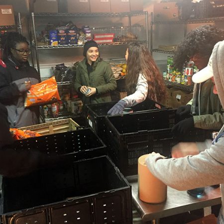 Alice Mathieu, Tamika Jones, Saphicher Gonzales, Katherine Ramirez, Victoria Decius, Yandry Varela. This morning our team worked on organizing the YMCA food pantry of Western North Carolina to prep food for distribution throughout the community of Asheville, North Carolina.