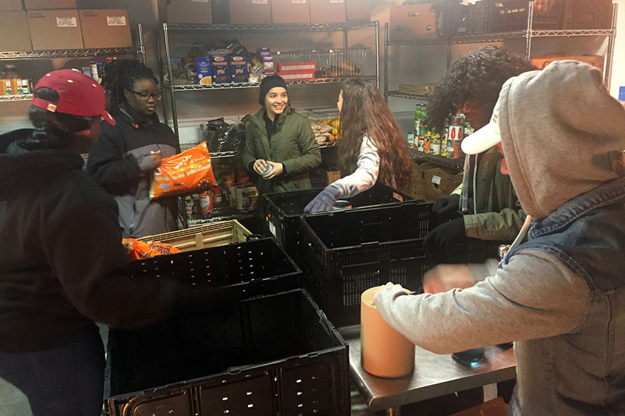 Alice Mathieu, Tamika Jones, Saphicher Gonzales, Katherine Ramirez, Victoria Decius, Yandry Varela. This morning our team worked on organizing the YMCA food pantry of Western North Carolina to prep food for distribution throughout the community of Asheville, North Carolina.