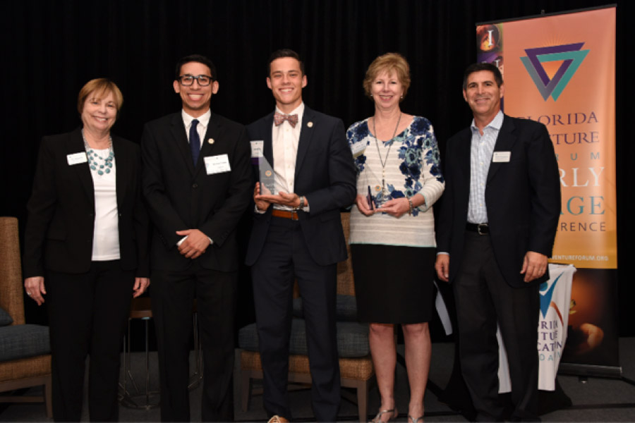 DiaTech won the grand prize of $15,000 at a business competition in Leon County. From left to right: Pat Schneider (Florida Venture Forum), Nicholas Cooper (DiaTech), John Wilcox (DiaTech), Wendy Plant (Jim Moran School of Entrepreneurship), Kevin Burgoyne (Florida Venture Forum)