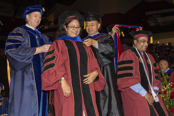 Chaity Banerjee Mukherjee and Tathagata Mukherjee, wife and husband, both receive their doctorate in computer science at the FSU Spring Commencement 2018 Friday afternoon ceremony. (FSU Photography Services)