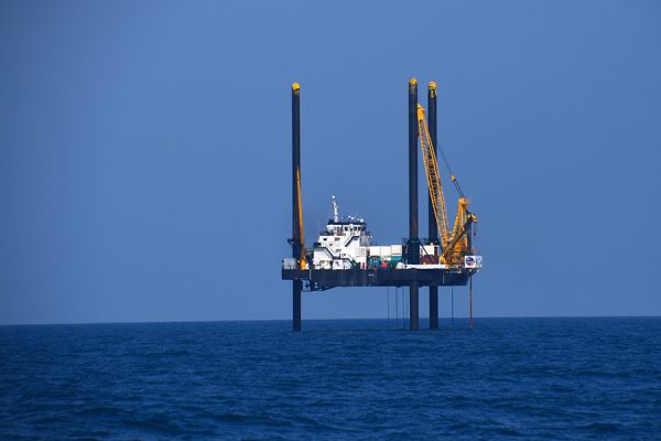 The core containing the first signs of life after the impact that wiped out the dinosaurs 66 million years ago was recovered from the crater by a 2016 scientific drilling mission conducted from the Lift Boat Myrtle (pictured here), a boat raised above the seafloor by three legs. (Credit: Chris Lowery, The University of Texas at Austin.)