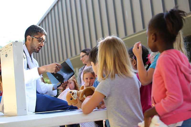 First-year med students at the FSU College of Medicine host a teddy bear clinic at Killearn Lakes Elementary School to help kids get more comfortable around doctors and medical equipment.