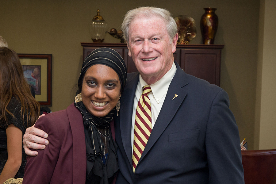 Power of WE founding director Inam Sakinah and President John Thrasher.