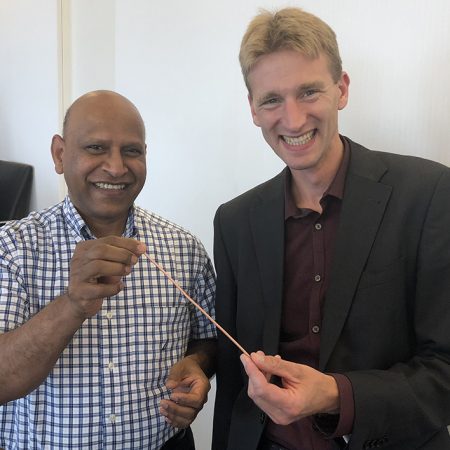 FAMU-FSU College of Engineering Professor and Associate Director of CAPS Sastry Pamidi and Danko van der Laan, president and CEO Advanced Conductor Technologies, show off Conductor on Round Core cable technology.