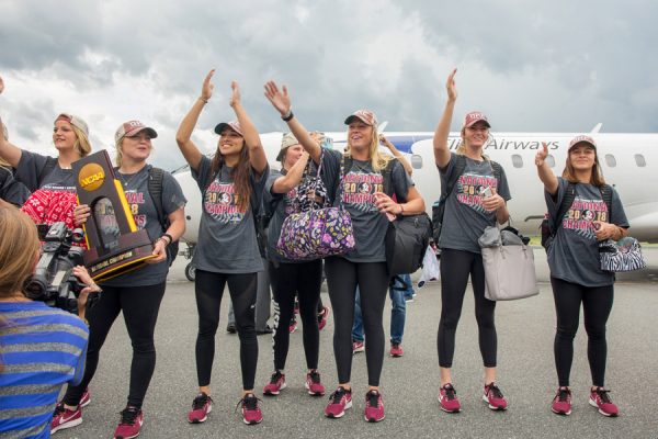 FSU's national champion softball players greet fans at Tallahassee International Airport on June 6, 2018, after arriving back home from the 2018 Women's College World Series in Oklahoma City. (FSU Photography Services)