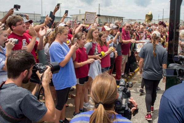 Fans line up to greet FSU's national champion softball players and get autographs at Tallahassee International Airport on June 6, 2018. (FSU Photography Services)