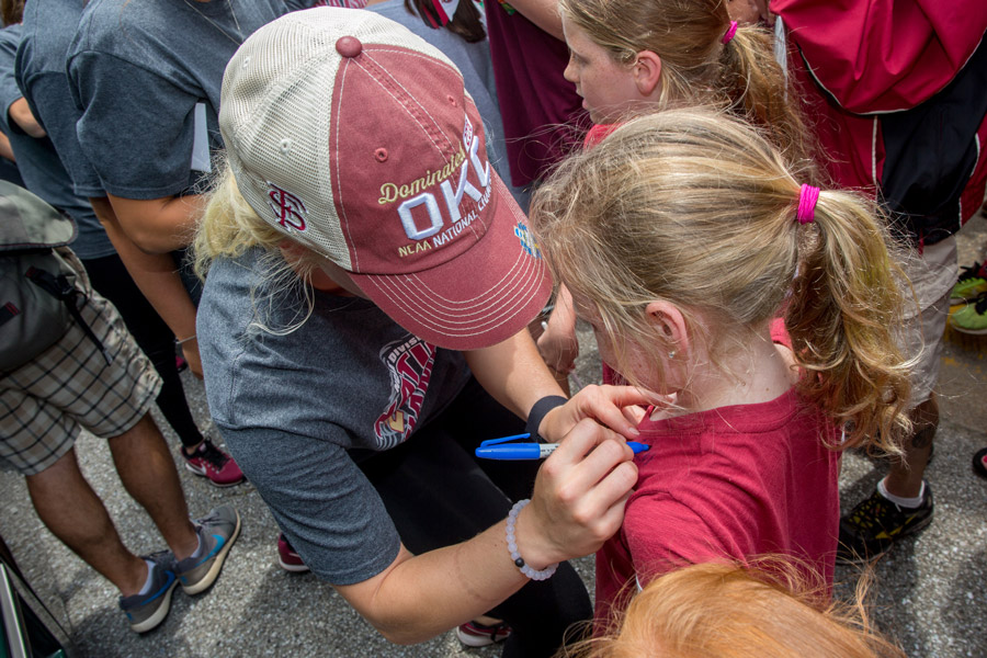 Fans line up to greet FSU's national champion softball players and get autographs at Tallahassee International Airport on June 6, 2018. (FSU Photography Services)