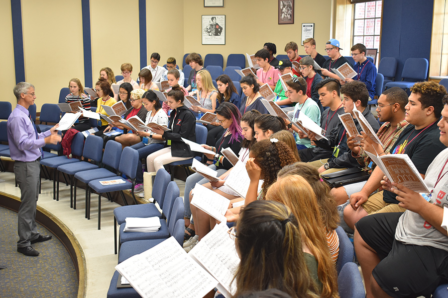 Choral campers rehearse with Kevin Fenton, professor of choral conducting and ensembles, at FSU Summer Music Camps.