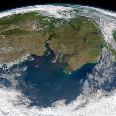 In two major Arctic rivers, a changing climate and shifting human activities are provoking a surprising response. (Credit: Norman Kuring, NASA)