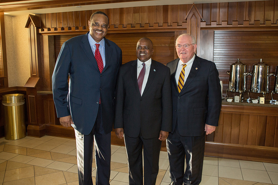 U.S. Rep. Al Lawson and Florida Sen. Bill Montford post with President Masisi at a reception Thursday, Sept. 20, 2018. (FSU Photography Services)