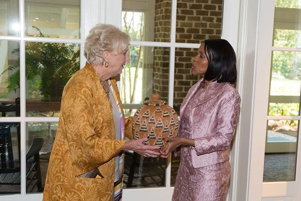 FSU First Lady Jean Thrasher and Botswana First Lady Mrs. Neo Jane Masisi exchange gifts during a luncheon at the President's House Thursday, Sept. 20, 2018. (FSU Photography Services)