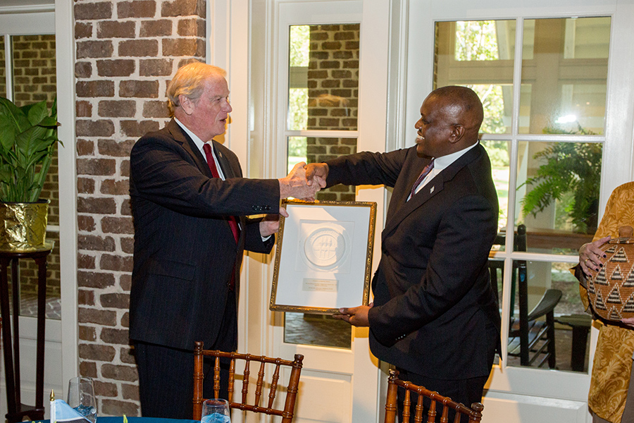 FSU President John Thrasher and Botswana President Masisi exchange gifts during a luncheon at the President's House Thursday, Sept. 20, 2018. (FSU Photography Services)