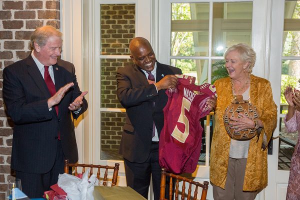 FSU President John Thrasher and Botswana President Masisi exchange gifts during a luncheon at the President's House Thursday, Sept. 20, 2018. (FSU Photography Services)