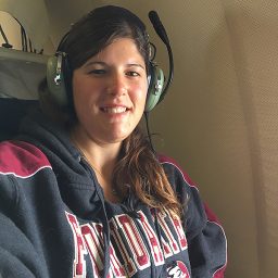 Holbach on board the NOAA research plane during a mission.