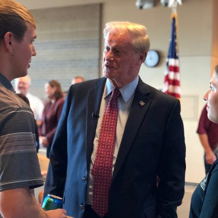 President Thrasher greets students as they return to class Monday, Oct. 29, for the first time since Hurricane Michael hit the Florida Panhandle.